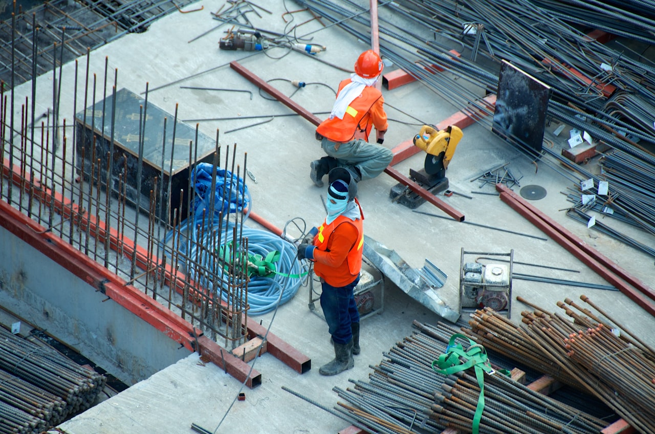 Skilled construction workers at a building site in Poland